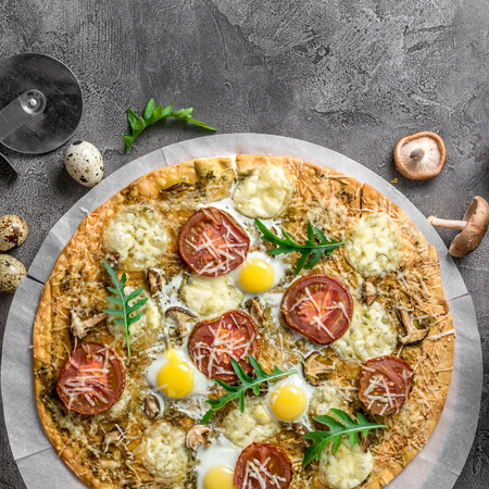 Homemade pizza with mushroomsの写真素材