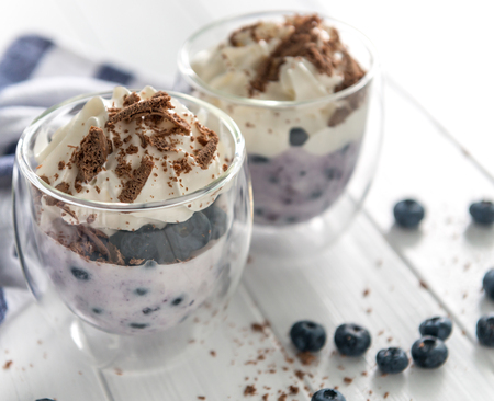 Dessert from yogurt with blueberries and chocolateの写真素材