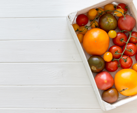Variety of kinds of tomato in a boxの写真素材