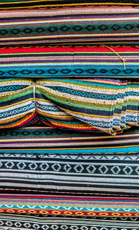 Various of colorful fabrics at a market stall in Kathmanduの写真素材
