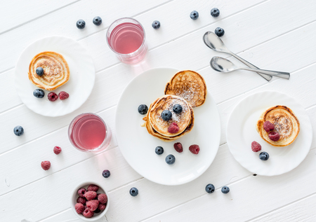 homemade fritters with raspberries and blueberries