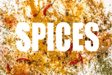 background of spilled spicesの写真素材