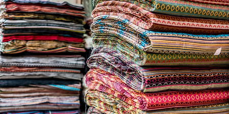 Various of colorful fabrics at a market stall in Kathmanduの写真素材