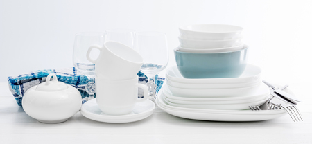 White square dinnerware set with glassesの写真素材
