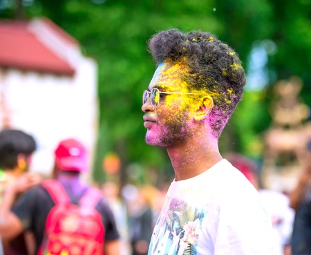 People celebrating Holi color festival in Kharkiv, Ukraine.のeditorial素材