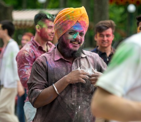 People celebrating Holi color festival in Kharkiv, Ukraine.のeditorial素材