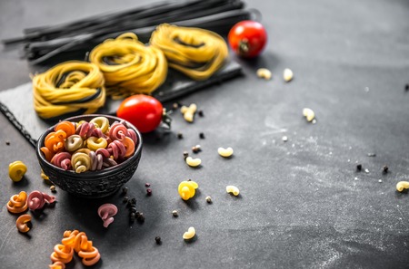 Still life of Italian pasta on grey stone backgroundの写真素材
