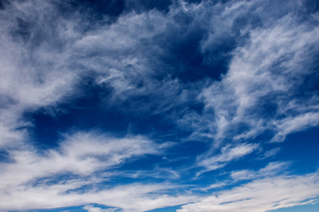 White clouds in a blue skyの写真素材