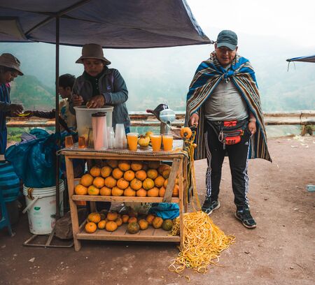 Peru village - 12 October 2018 : Pepople selling fresh juiceのeditorial素材