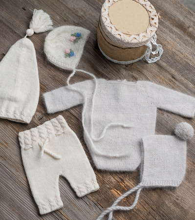 knitted newborn baby clothesの写真素材