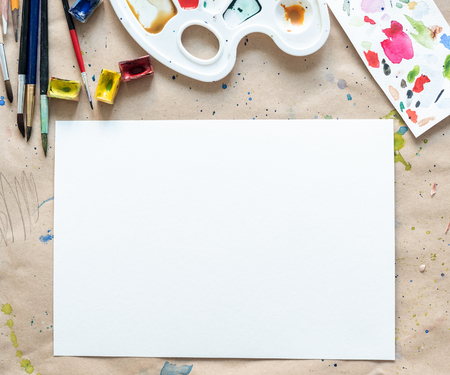 Workplace of an artist-painter on the paper coverの写真素材