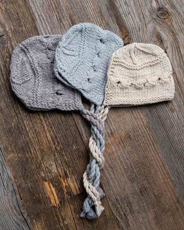 Set of tender knitted hats for newbornの写真素材