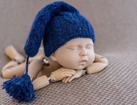 Mannequin of newborn for photo posing