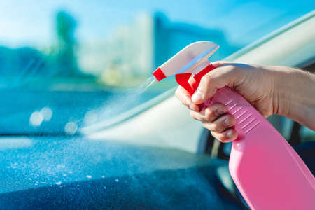 Interior car washing with cleanserの写真素材