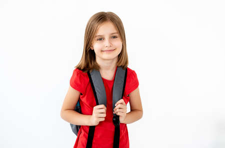 Portrait of school girl with backpack
