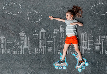 Girl in roller skates painted with chalkの写真素材