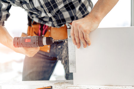 Man working during process of furniture manufacturingの写真素材