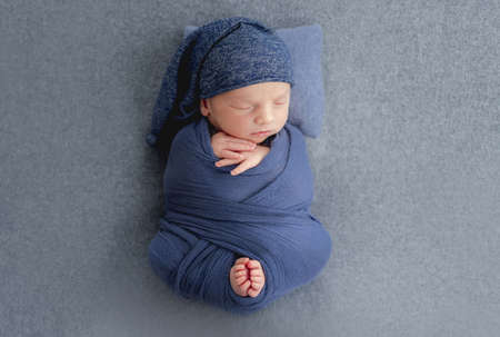 Newborn baby boy sleepingの写真素材