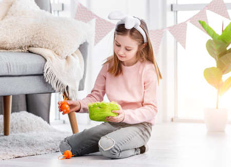 Little girl at Easter dayの写真素材