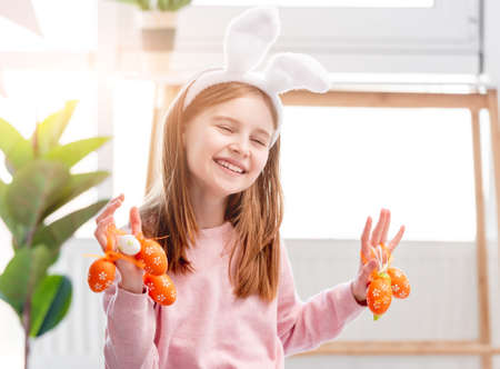 Little girl at Easter dayの写真素材