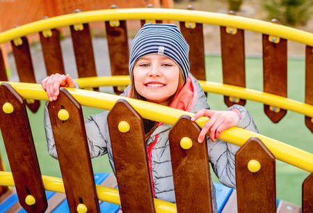 Little girl on playgroundの写真素材