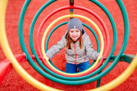Little girl on playgroundの写真素材