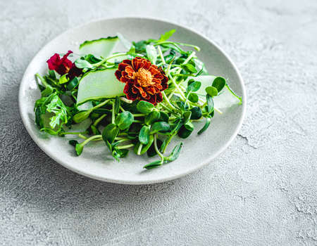 Delicious salad with flowersの写真素材