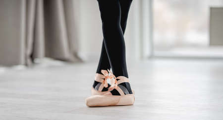 Ballerina legs in pointe shoes