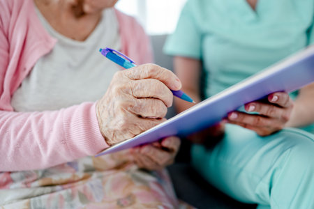 Elderly woman and nurseの写真素材
