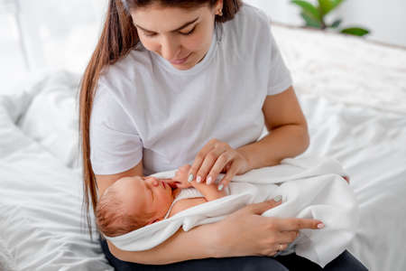 Mother with newborn baby