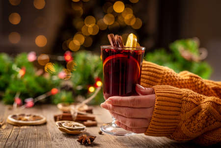 Glass cup with mulled hot wine