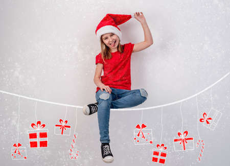 Little girl on chalk drawn threadの写真素材