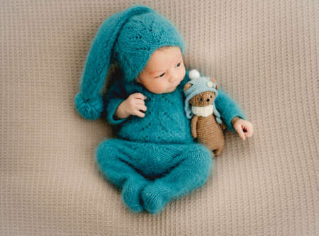 Newborn baby boy studio portrait