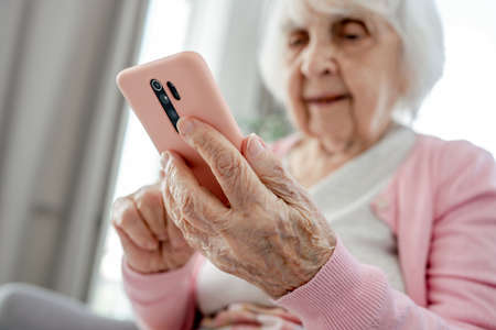 Senior woman with smartphone