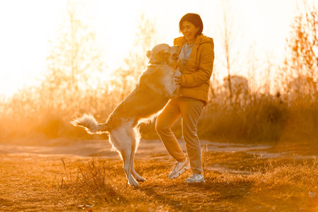 Girl with golden retriever dog