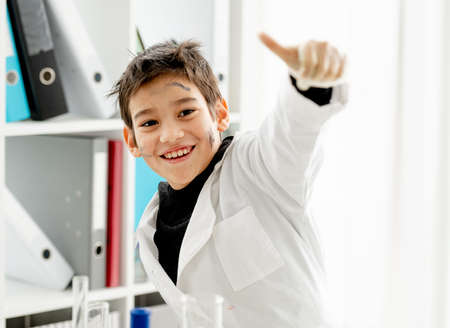 School boy in chemistry classの写真素材