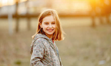 Preteen girl outdoors