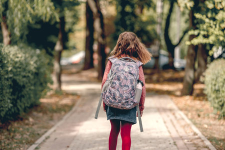 Preteen school girl with backpackの写真素材