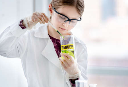 Girl on chemistry lesson