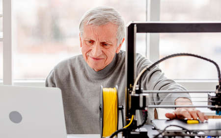 Man with 3D printer