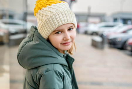Preteen girl street portrait in cityの写真素材