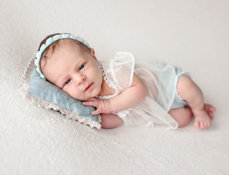 Newborn baby girl studio portraitの写真素材