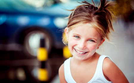 Portrait of a happy cute liitle girl close-upの写真素材
