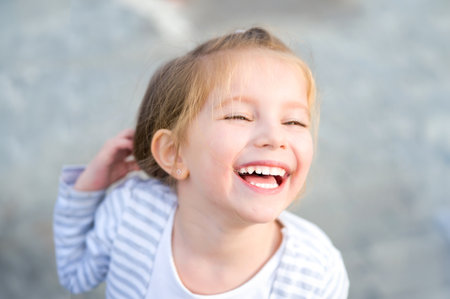 Portrait of a beautiful liitle girl close-upの写真素材