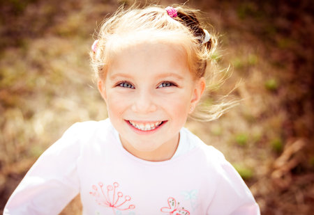 Portrait of a beautiful liitle girl close-upの写真素材