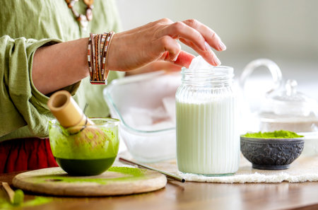 Woman Preparing Matcha Green Tea With Ice Close-Up