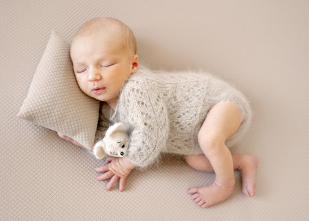 Newborn Baby With Toy At A Photoshootの写真素材