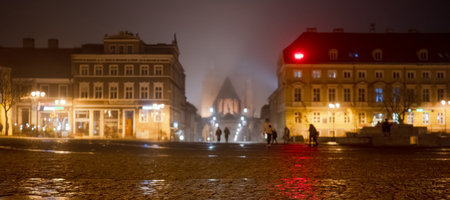 Central Square Of A Polish Town In The Rain With A Soft Focusの写真素材