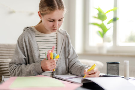 Girl Holding Markers Does Homework At Home