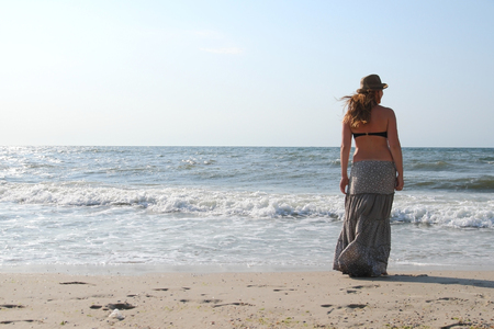 The girl on the beachの写真素材